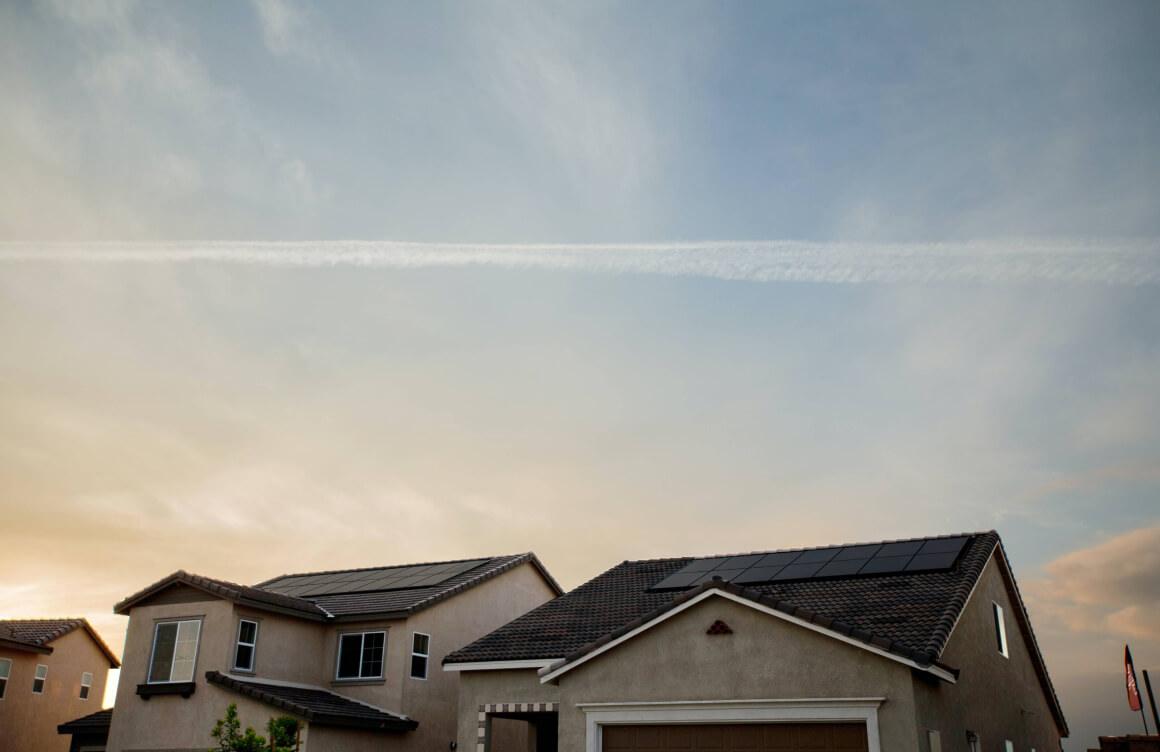 Homes with solar panels on their roofs